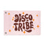 The Disco Tribe Flag is a pale pink festival flag featuring bold, retro-style brown “DISCO TRIBE” text surrounded by vibrant orange star shapes. Designed with two metal grommets on the left side, this flag is perfect as a standout festival totem or unique décor piece.