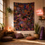 a cozy and vibrant living space with a large, colorful tapestry hanging on the wall, a yoga mat on the floor, and various decorative elements such as potted plants and a neon sign.