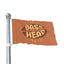 The Bass Head Festival Flag New features bold, stylized “BASS HEAD” lettering surrounded by a graphic that resembles lips or a mouth, all set against an eye-catching orange background on a flagpole—making it the perfect centerpiece for your rave cave or a standout totem at any festival.