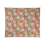 a square-shaped floral print with a repeating pattern of various colored flowers, including pink, orange, white, and green.