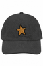 The StarGaze Corduroy Cap is a vintage-style black corduroy baseball cap featuring a gold star patch outlined in black at the front center, and comes with an adjustable strap for a comfortable fit.