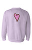 The "Bad Bitches Love Bass Crewneck" is a light purple vintage sweatshirt featuring a simple pink heart outlined in brown, centered on the back—perfect for festival clothing with a playful twist.