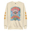 The Disco Tribe Festie Club Crewneck is a beige sweatshirt adorned with vibrant “Disco Tribe Festie Club” lettering, a colorful UFO graphic, swirling blue accents, a heart detail at the hem, and playful yellow stars running along each sleeve for an energetic festival-inspired look.