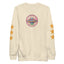 The Disco Tribe Festie Club Crewneck is a beige, vintage-inspired sweater with a vibrant UFO graphic on the back and five yellow stars down each sleeve, making it the perfect unique addition to your festival sweatshirt collection.